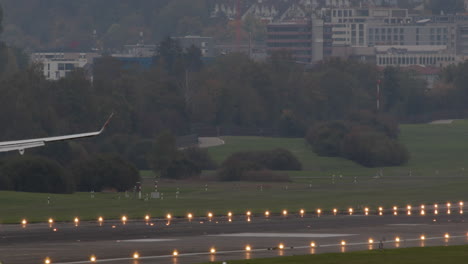 super slow motion shot of airplane landing at the airport