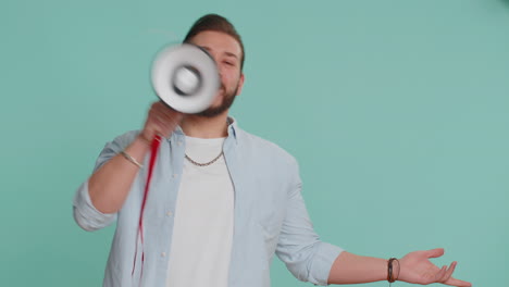 man talking with megaphone, proclaiming news, loudly announcing advertisement pointing empty place