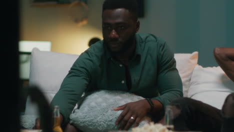 men watching tv at home