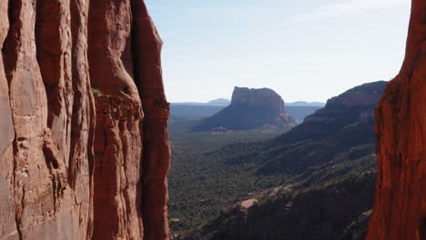 flying through rocky mountain canyon at sedona, arizona - aerial drone shot