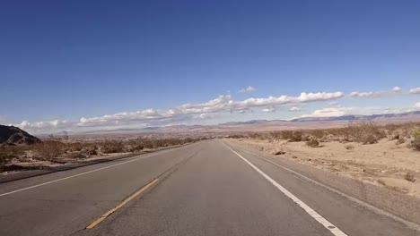 timelapse dash cam through rural california desert landscape