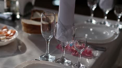 transparent and crystal goblets on the table in a cafe