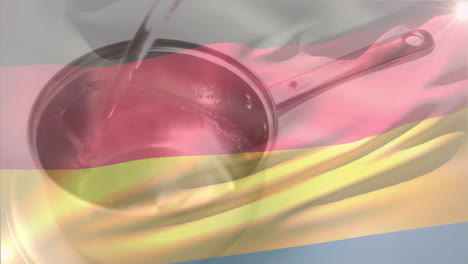 pouring liquid into saucepan with german flag animation in background