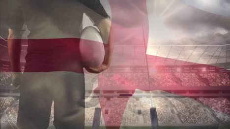 english rugby player looking at the stadium with an english flag on the foreground