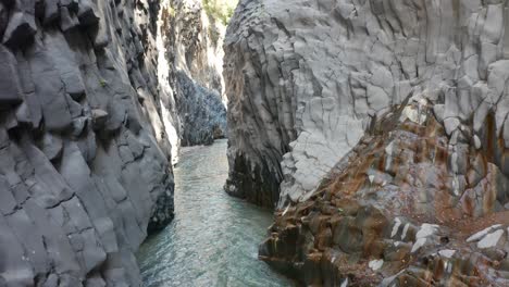 drone-flying-inside-Alcantara-river-gore-in-Sicily-without-people