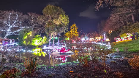 People-enjoy-colorful-bright-Christmas-town,-hyper-lapse-view