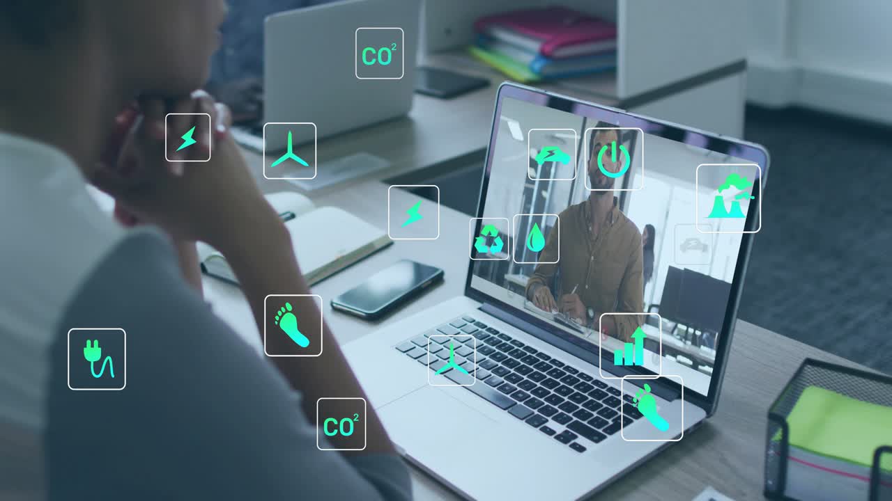 Call connecting woman conferencing, visualizing sustainability icons drifting around office laptop