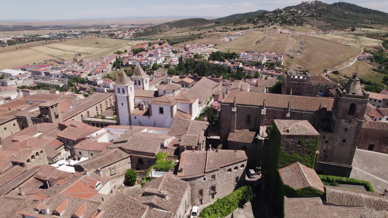 Aerial lateral view: San Francisco Javier and San Mateo churches, C&aacute;ceres, Spain