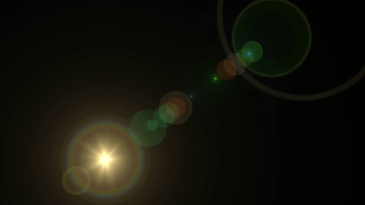 검은 바탕에 현실적인 빛 렌즈 플레어.