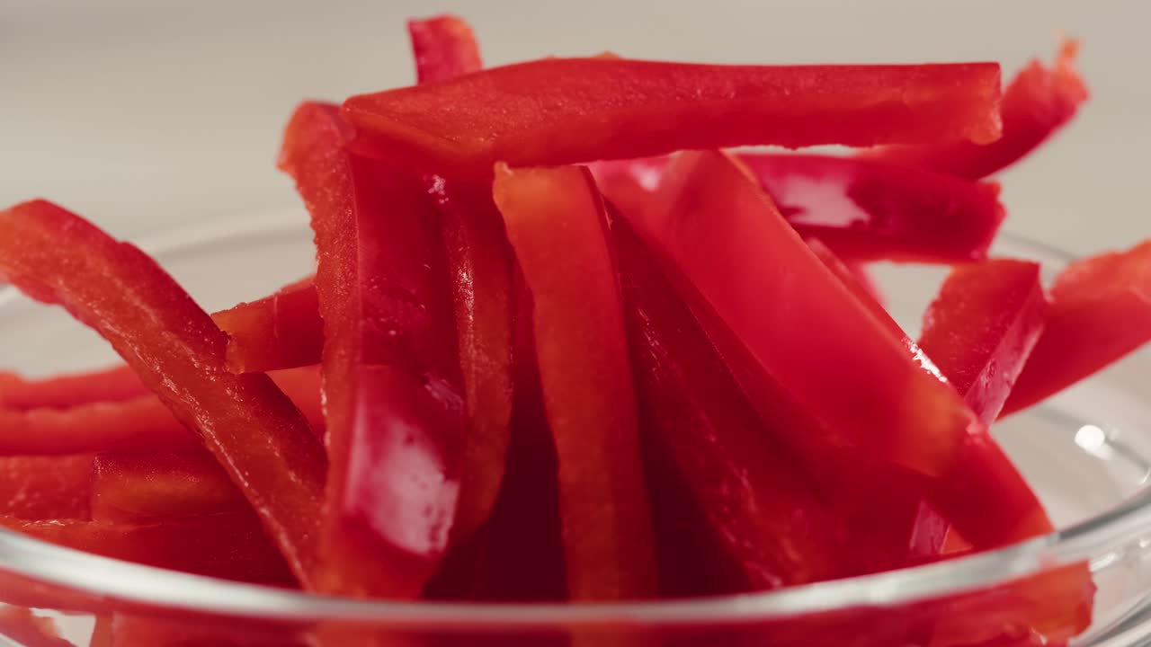 Sliced Red Pepper in a Glass Bowl