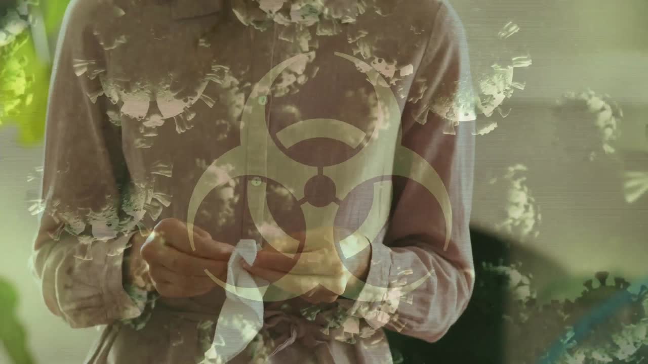 코로나 19 세포의 애니메이션이 마스크를  ⁇ 는 사람 위에