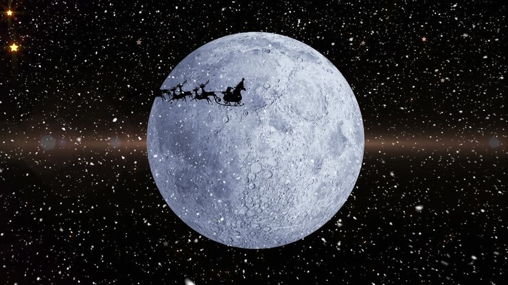 Neve caindo sobre o Papai Noel em um trenó puxado por renas contra a lua e estrelas brilhantes.