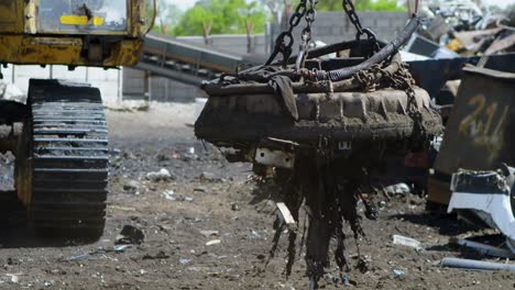 excavator machine being operated in the junkyard 4k