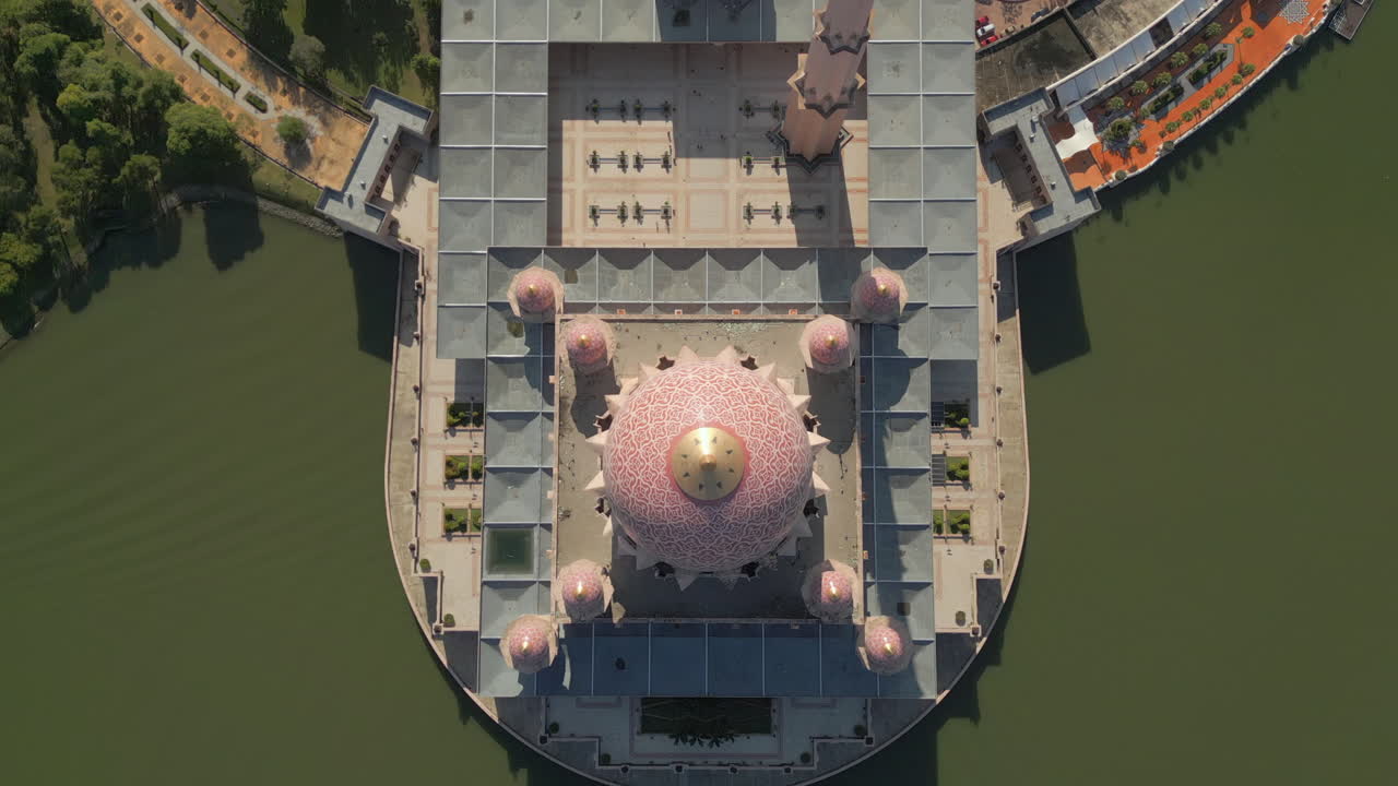 Putra Mosque Kuala Lumpur Malaysia Surrounded By Water Birdseye View Drone Track Back 4K 60FPS
