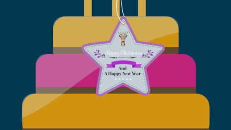 animation of christmas greetings on tag, on cake on navy background