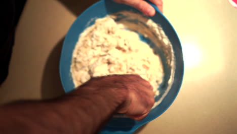 Knead-dough-inside-a-plastic-jar-very-nice-and-slow