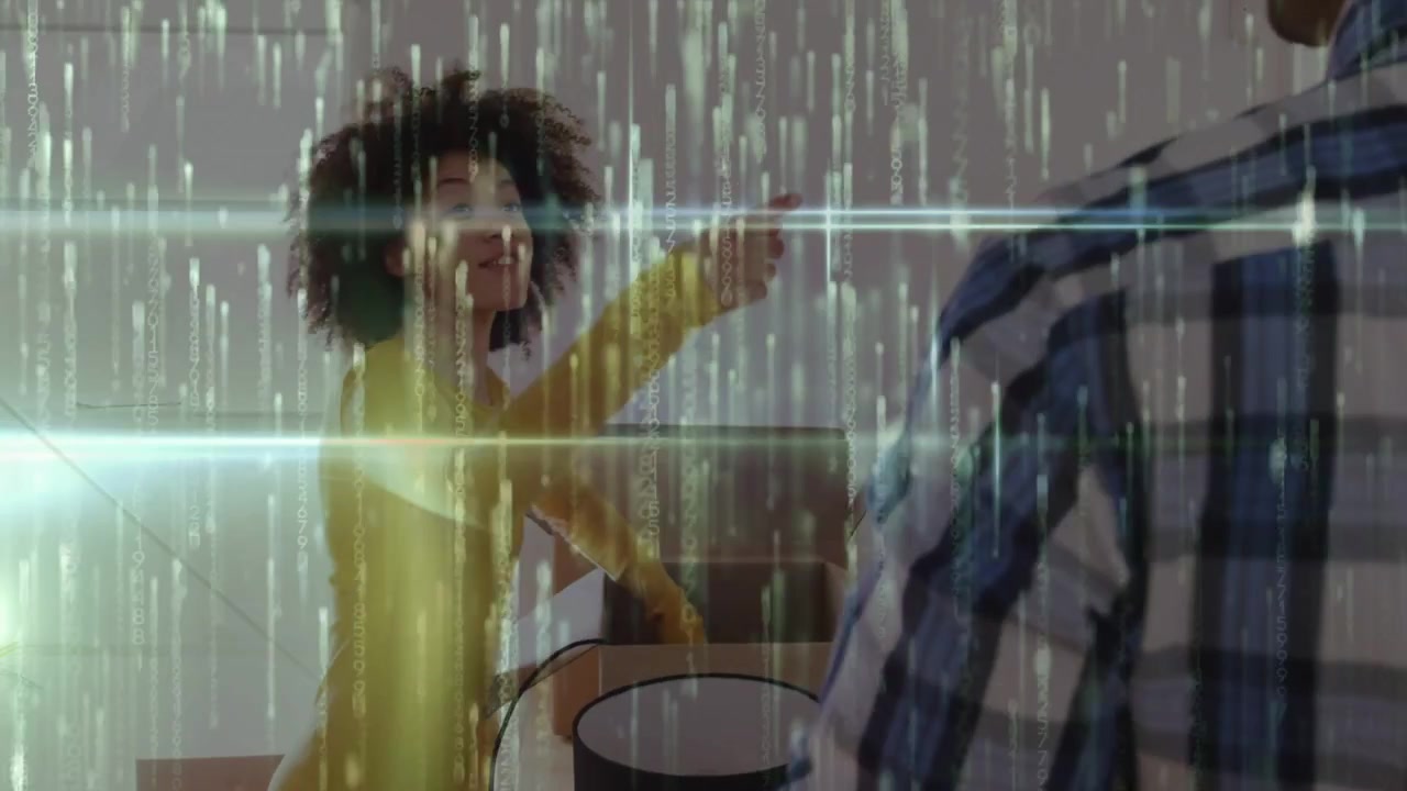 Woman assembling lamp for lighting, lifting shade to set up while man assisting, scanlines rolling