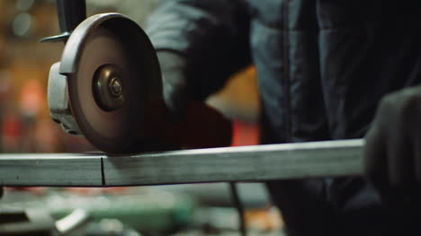 angle grinder cutting metal at workshop 27