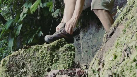 tyinh shoes in the jungle