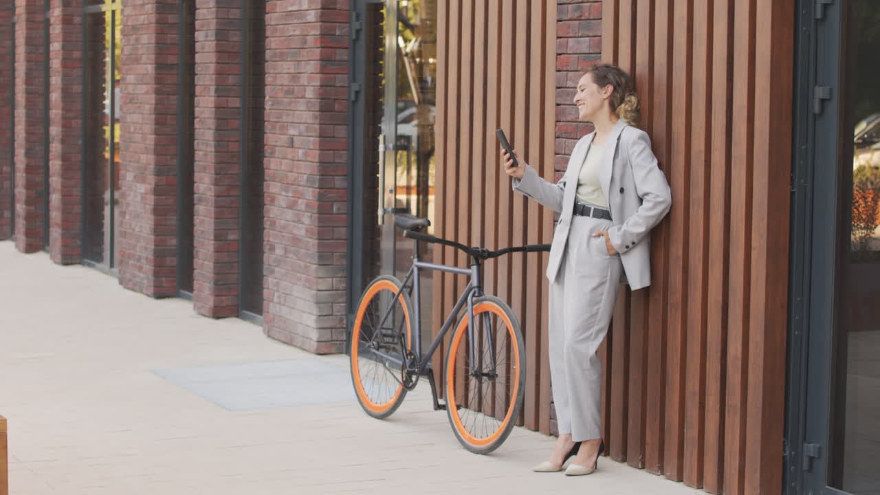 Active Businesswoman Video Chatting Outdoors