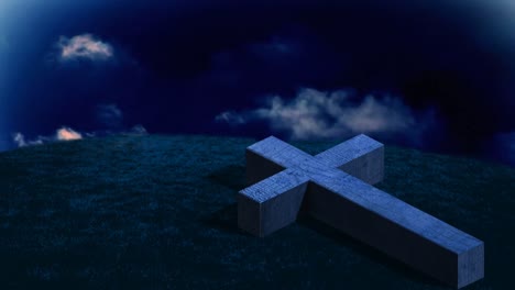 animation of wooden christian cross lying on field of grass with dark background