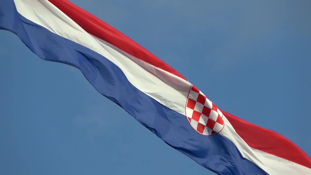 4K. Croatian flag waving in the wind. The tricolour flag