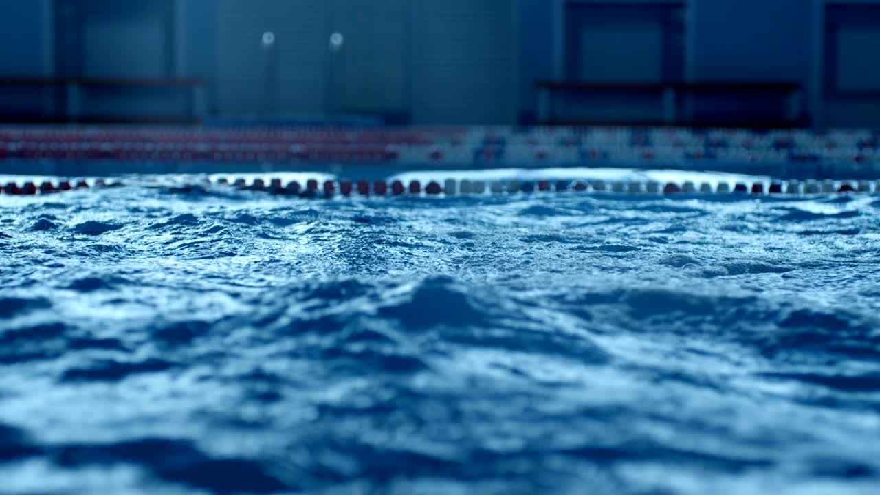 프로 수영 선수가 수영을 한 후 수영장에서 는 물처럼 큰 파도가