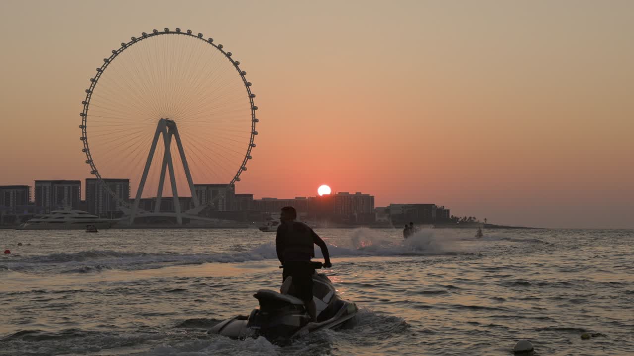Unsurpassed Sunset Over The Biggest Ferris Wheel In Dubai Marina UAE.