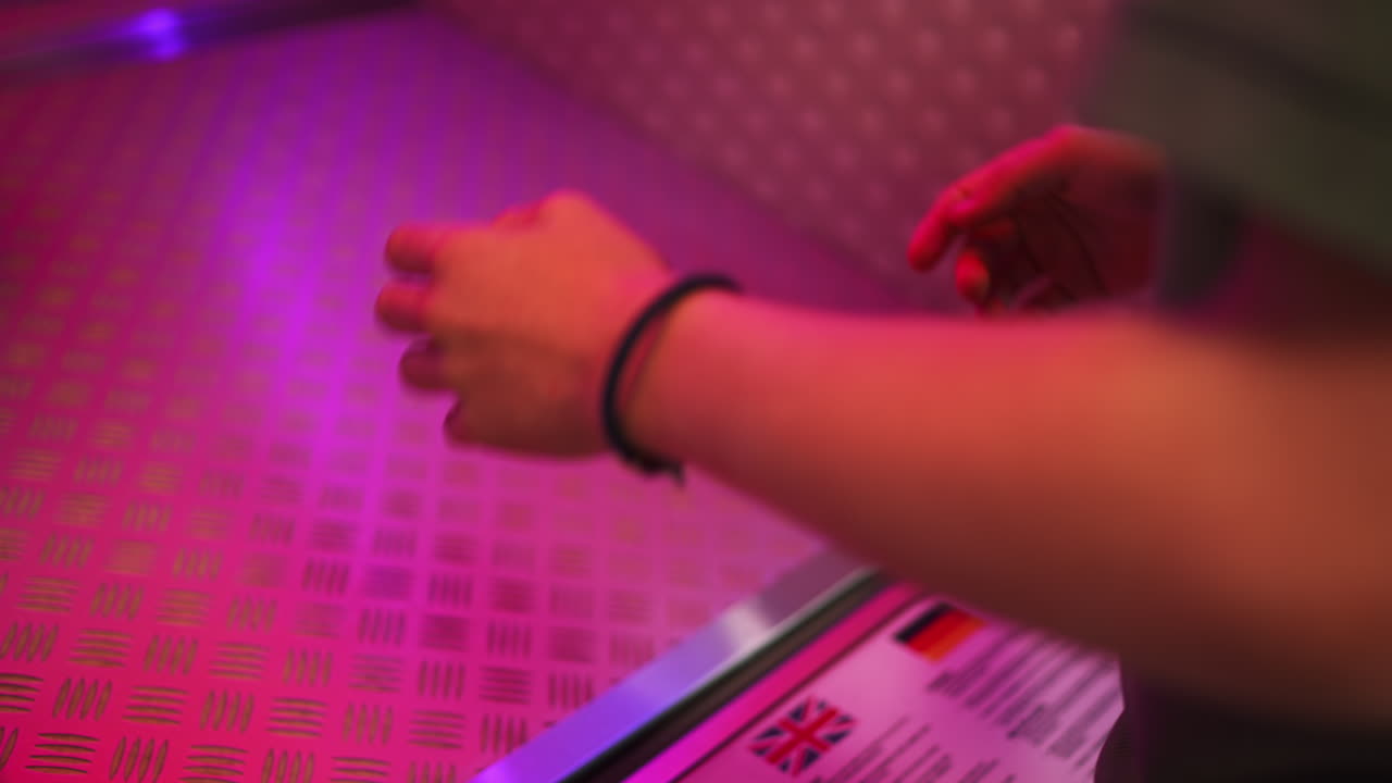 Arcade game with ball and person