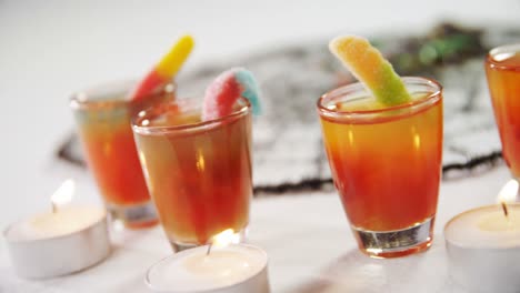 tealight candles and drinks on white background 4k