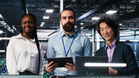 happy data center colleagues collaborating on software development