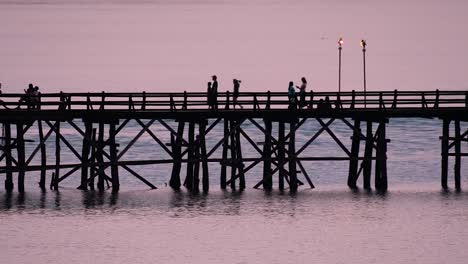 The-Mon-Bridge-is-an-old-wooden-bridge-located-in-Sangkla,-Thailand