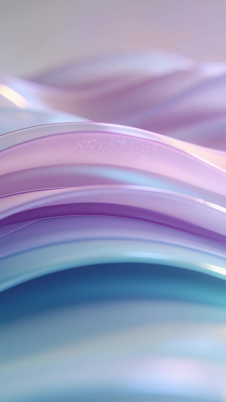 Vertical video: Panning camera moving along translucent wavy ribbons in studio, revealing sparkles
