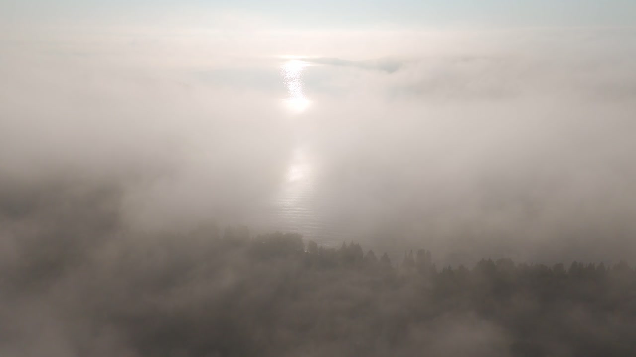 Dense morning fog at Lake Superior shoreline at Ontario Canada