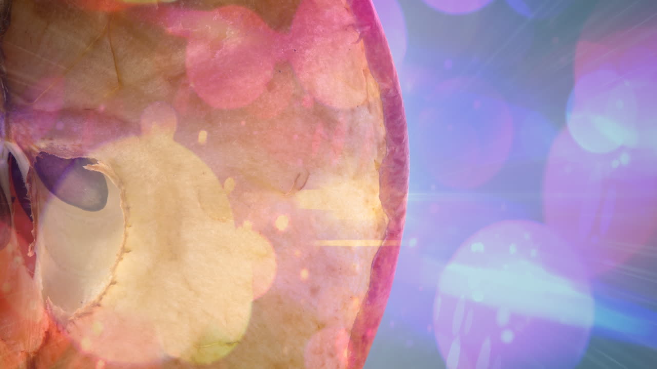 animación de puntos de luz sobre la manzana