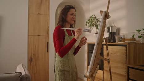 woman painting at home