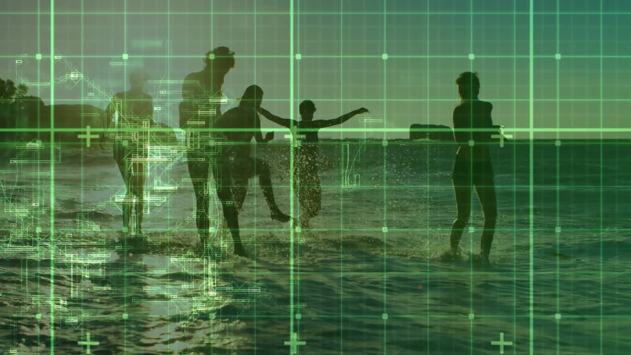 Silhouettes of people playing in ocean over digital grid animation