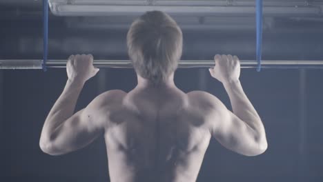 man performing pull-ups