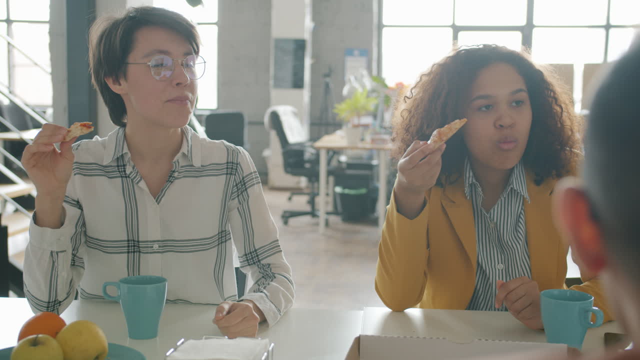 Business Colleagues Enjoying Lunch Break