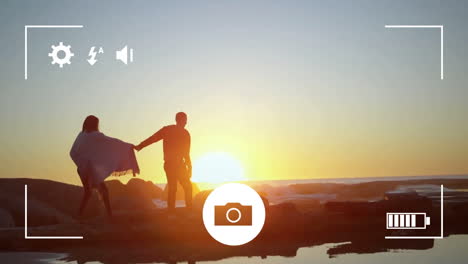 tomando fotos de una pareja con una cámara digital