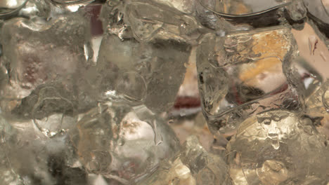 cocktail ingredients on ice cubes extreme close-up-3