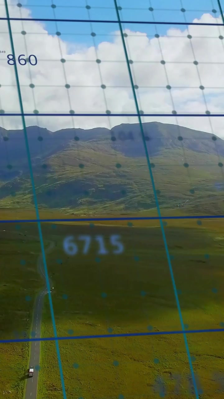 Vertical video: Camera tilting causing grid overlay updating and numbers flashing tracking vehicle