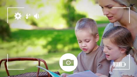 taking photos of a family on a digital camera