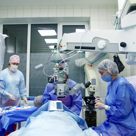 medical team performing eye surgery