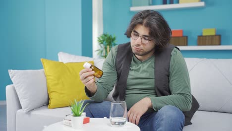 depressed man is taking antidepressants.