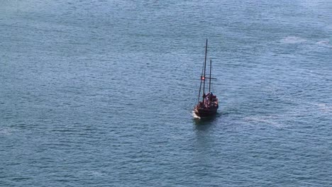 Jolly-Roger-flies-over-tourist-pirate-boat-going-on-sightseeing-tour