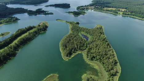 beautiful lake archipelago in lithuania, high angle drone view