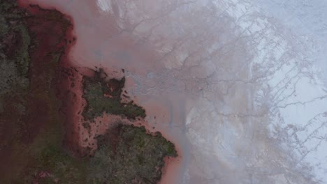 rich mineral sulfur white surface at geothermal landscape, top down