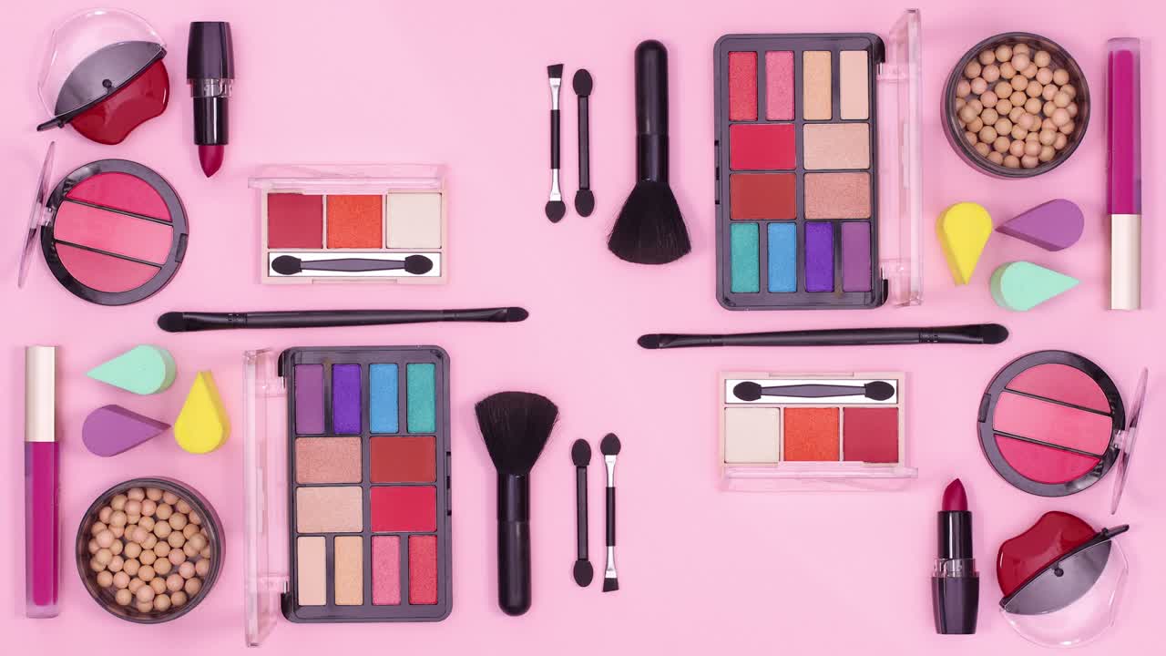 Pastel pink theme with make up products moving. Stop motion