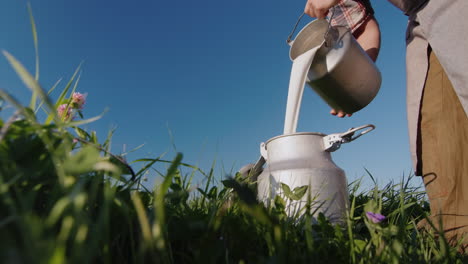 man pours milk into a can 1